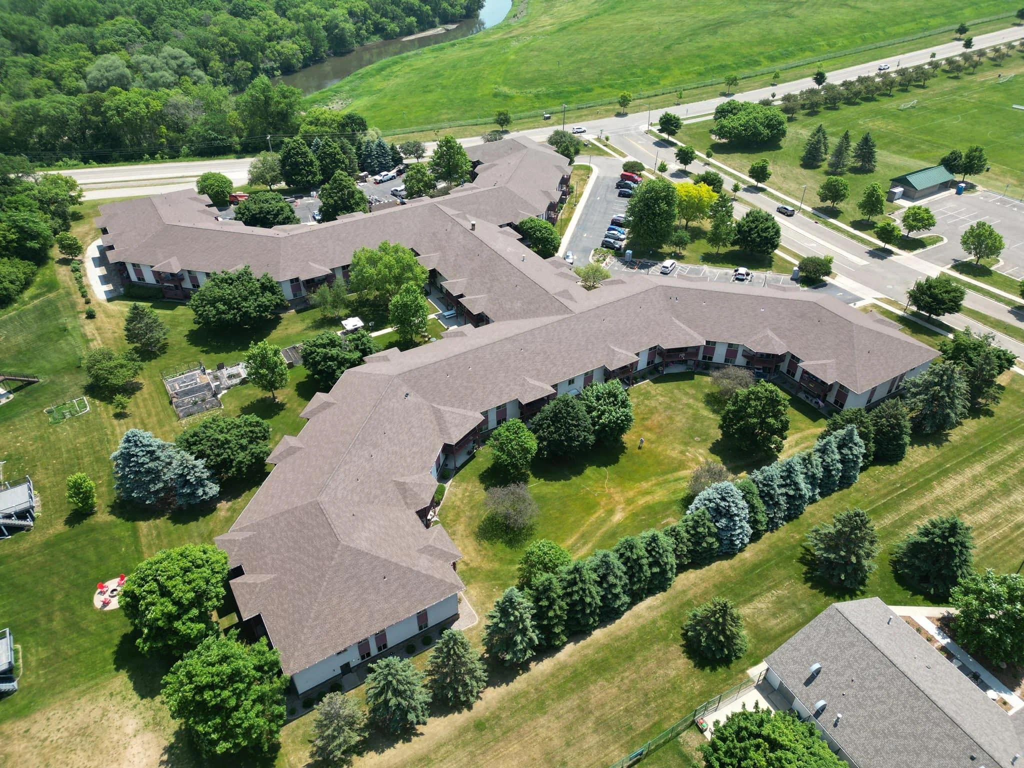 Aerial view of a completed roofing project